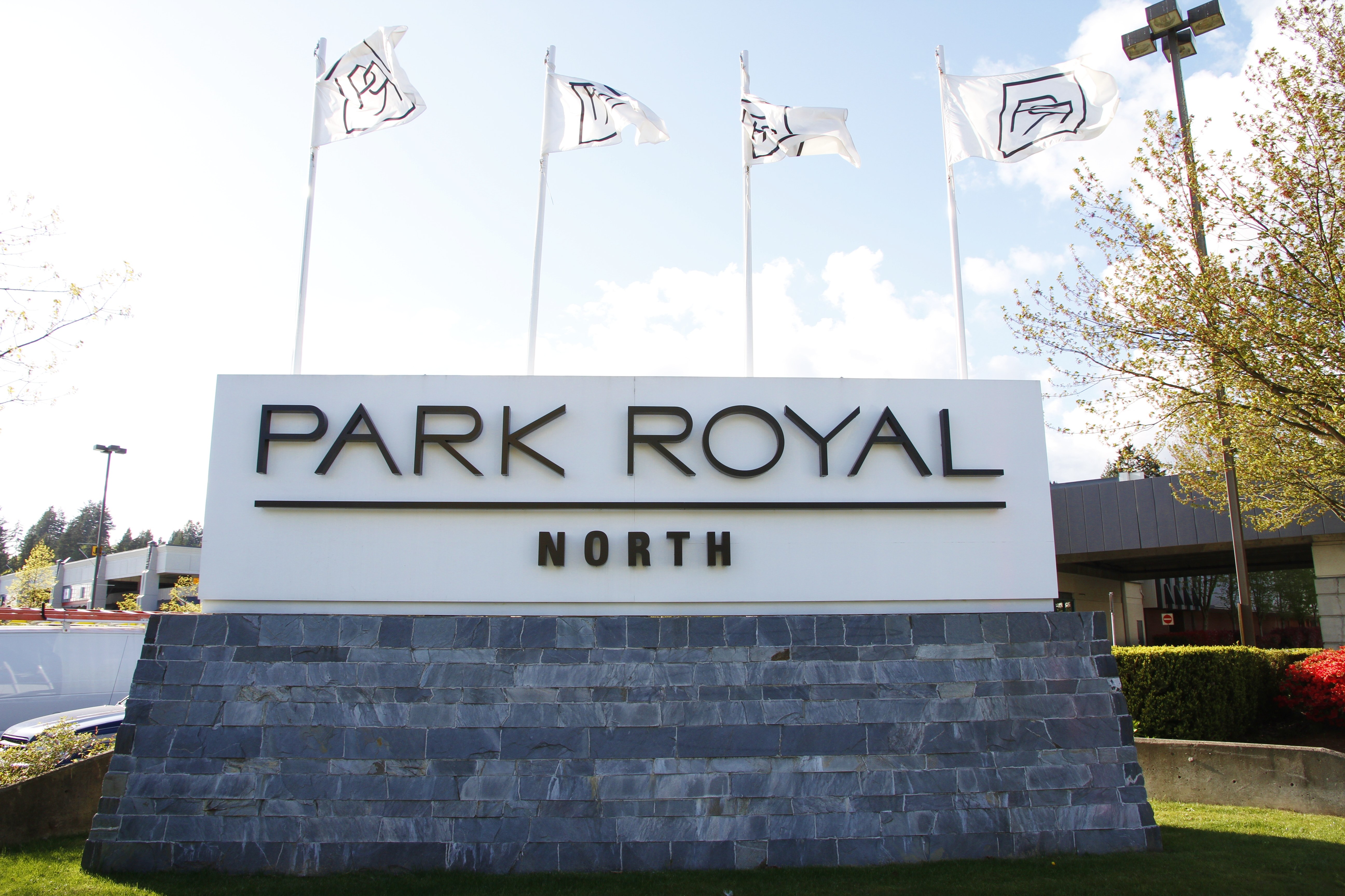 Exterior Retail Signage With Stone K2 Stone