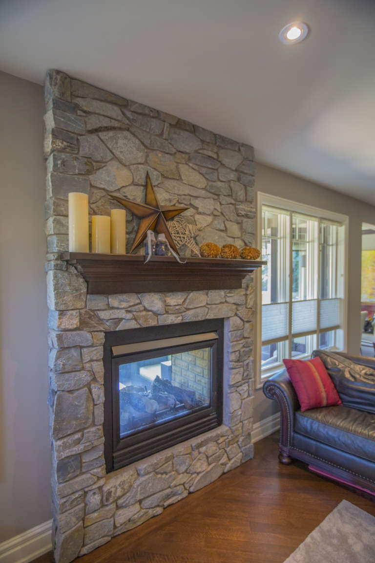 Double Sided Fireplace with Stone