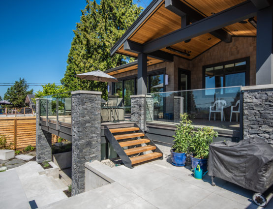 Covered Deck Outdoor Living Space Stone Posts